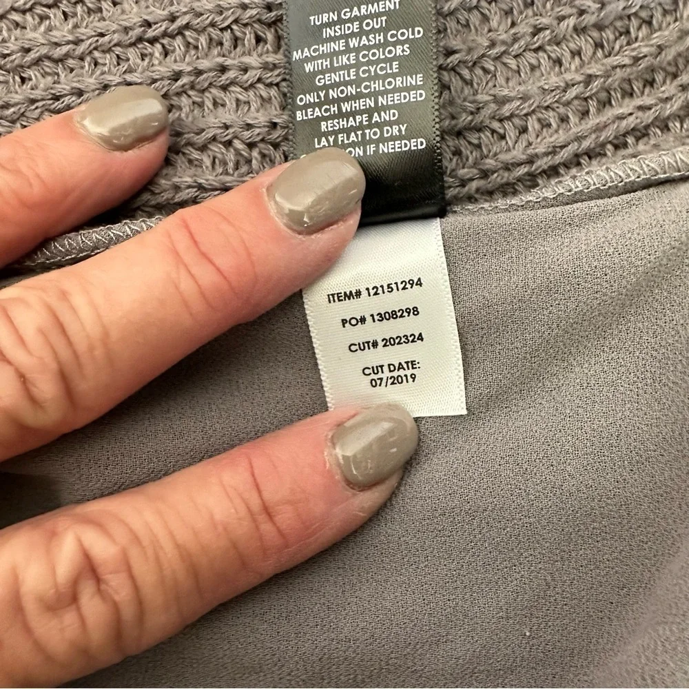 Torrid gray v-neck sweater.